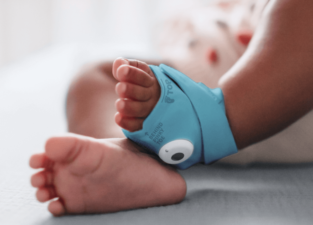 Baby feet with monitoring device