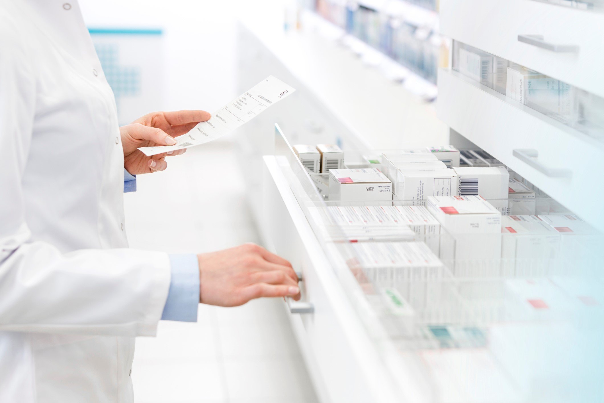 Pharmacist filling prescription in pharmacy - stock photo CaiaimageAgnieszka WozniaGetty Images