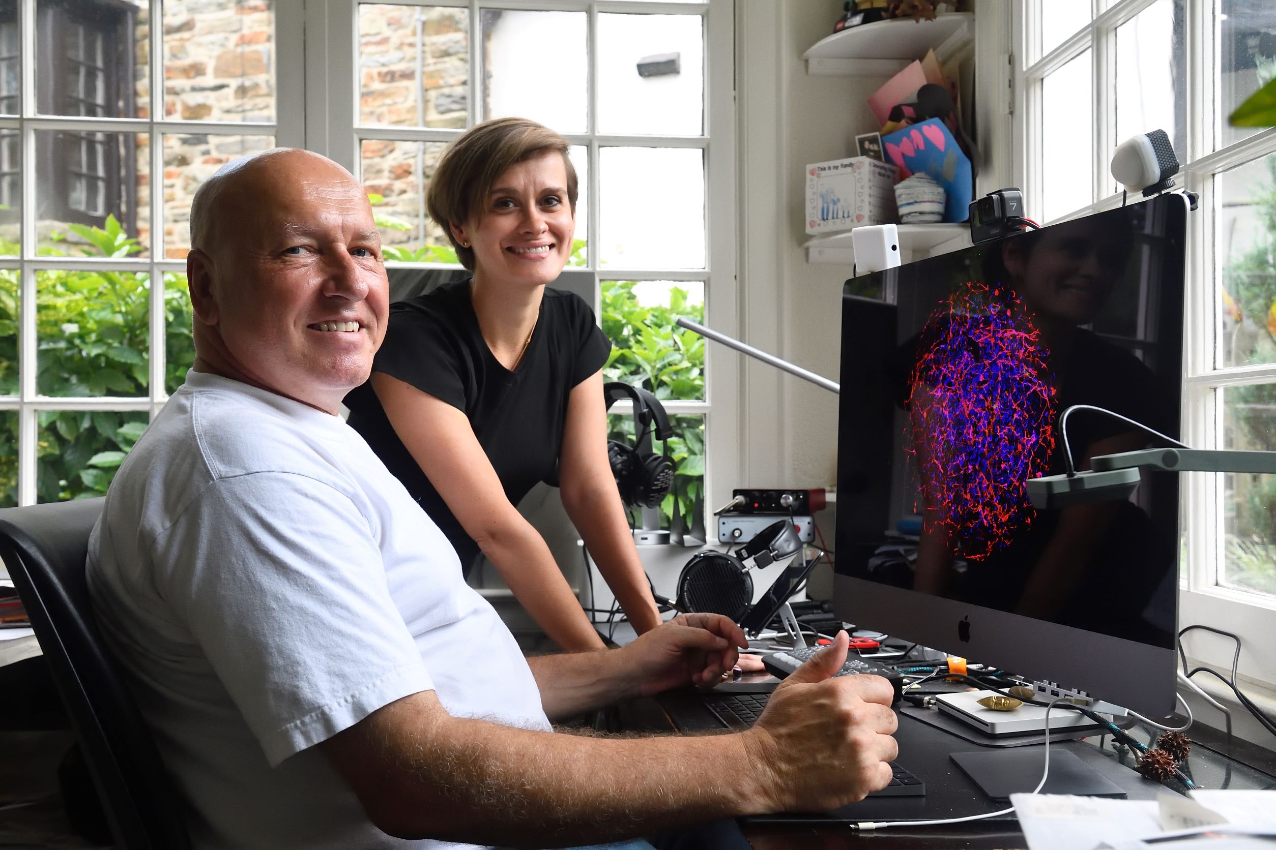 Thomas Hartung MD PhD and Lena Smirnov PhD display an organoid on the screen