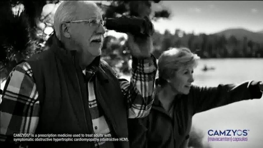 A shot from BMS first Camzyos branded TV ad showing Mike holding binoculars 