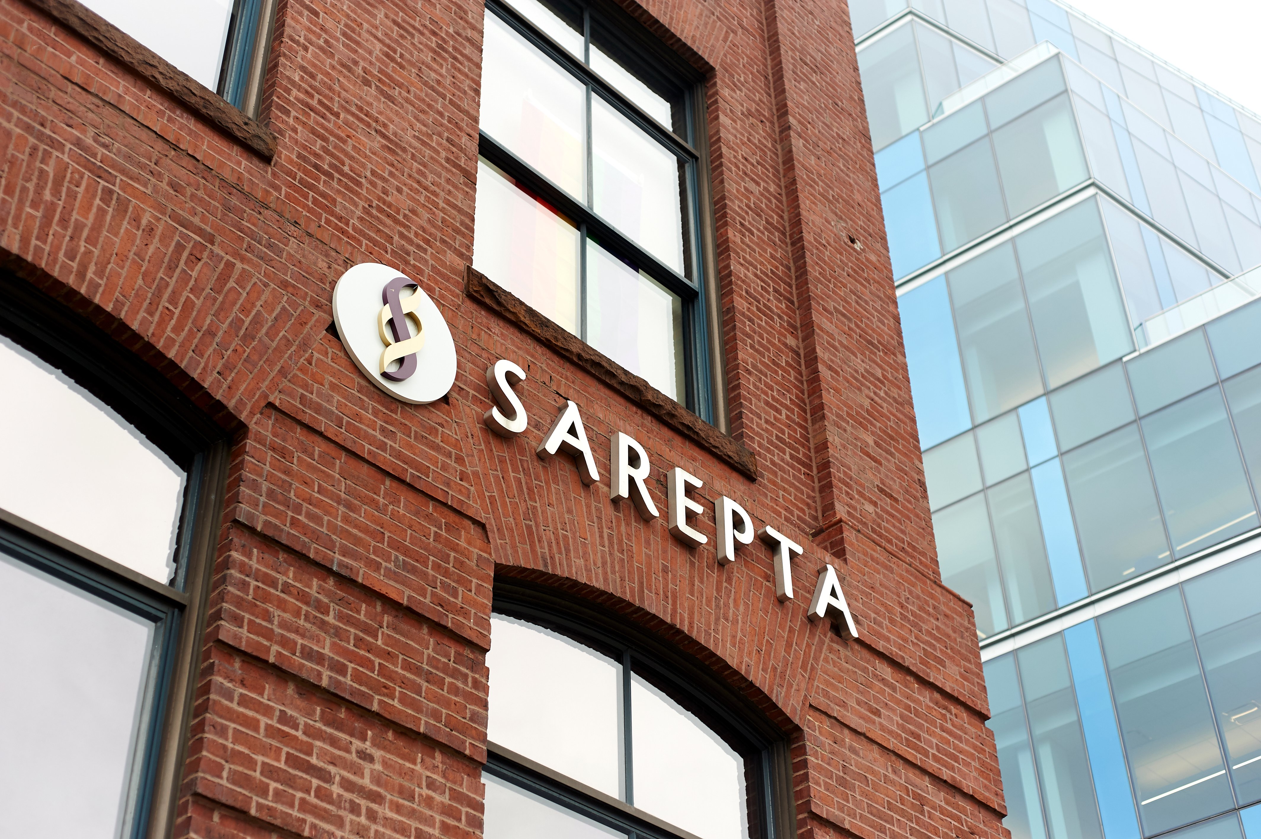 Redbrick building with Sarepta name and logo