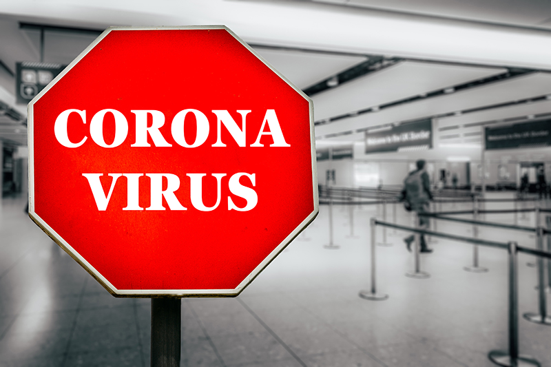 Coronavirus stop sign airport  travel ban