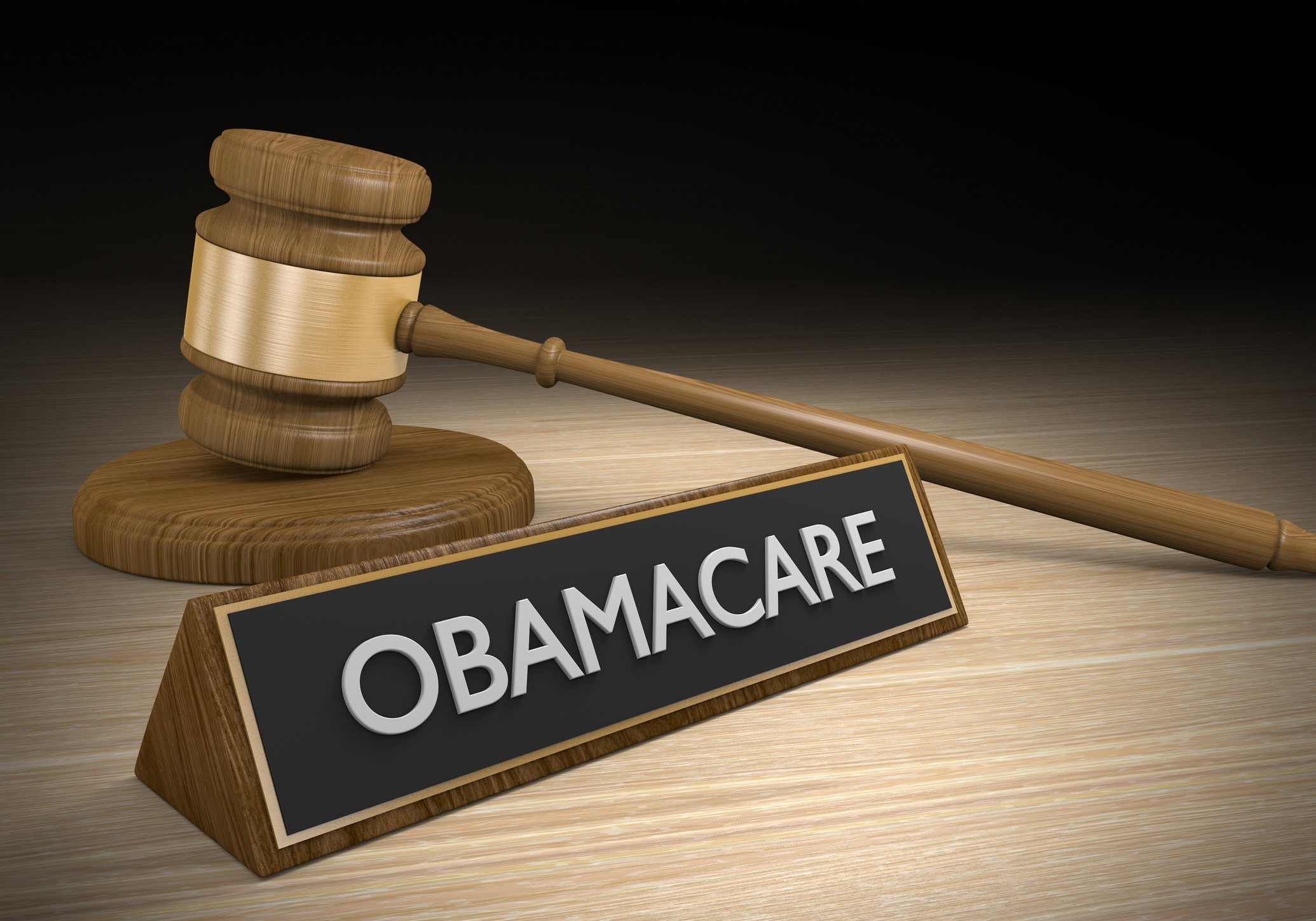3D render of a court gavel next to a plaque that says Obamacare