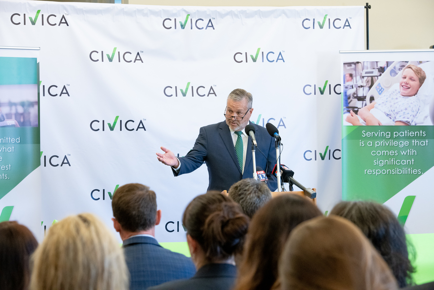 CEO Martin VanTrieste addresses a crowd at Civica Rx headquarters