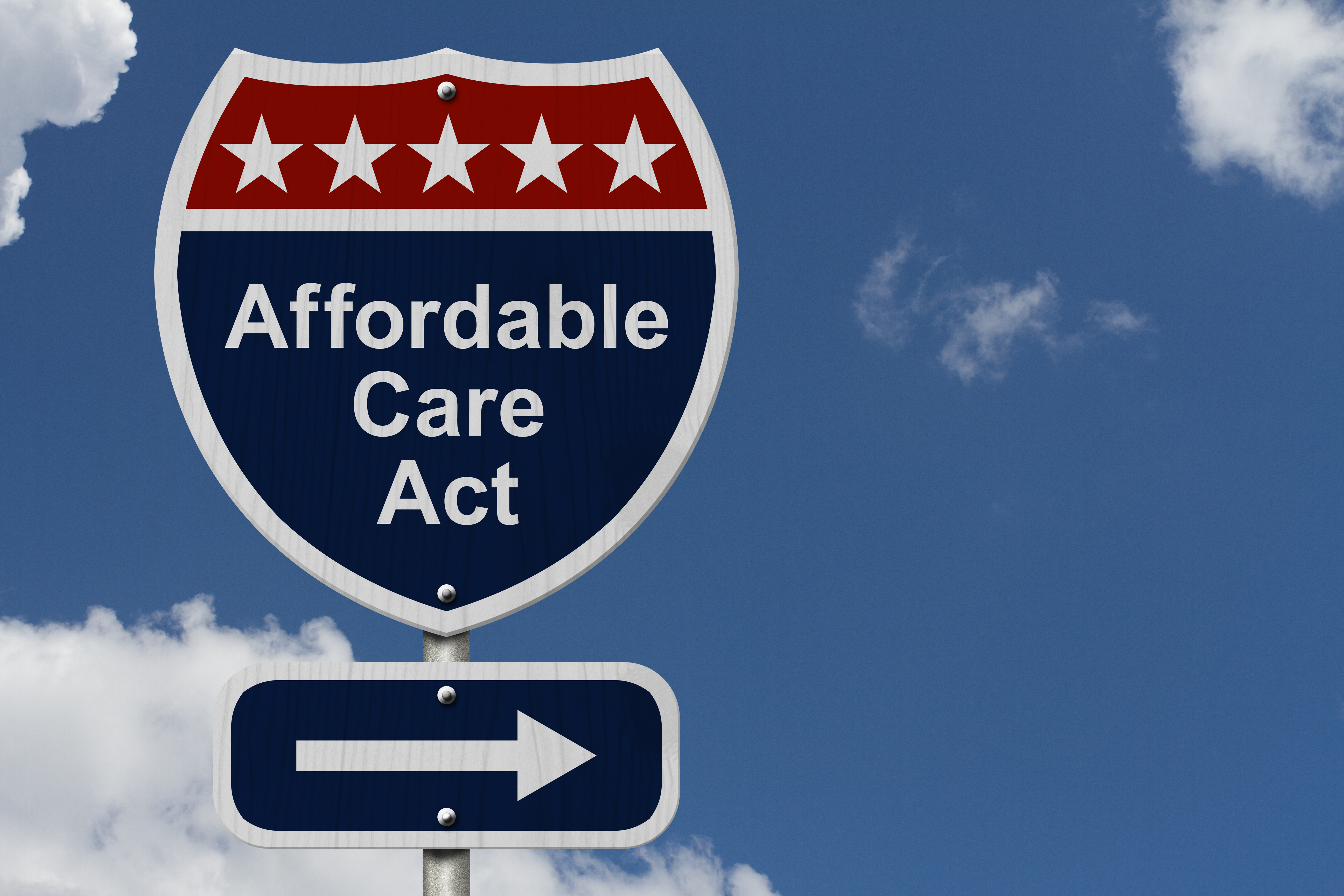 A signpost with the words Affordable Care Act