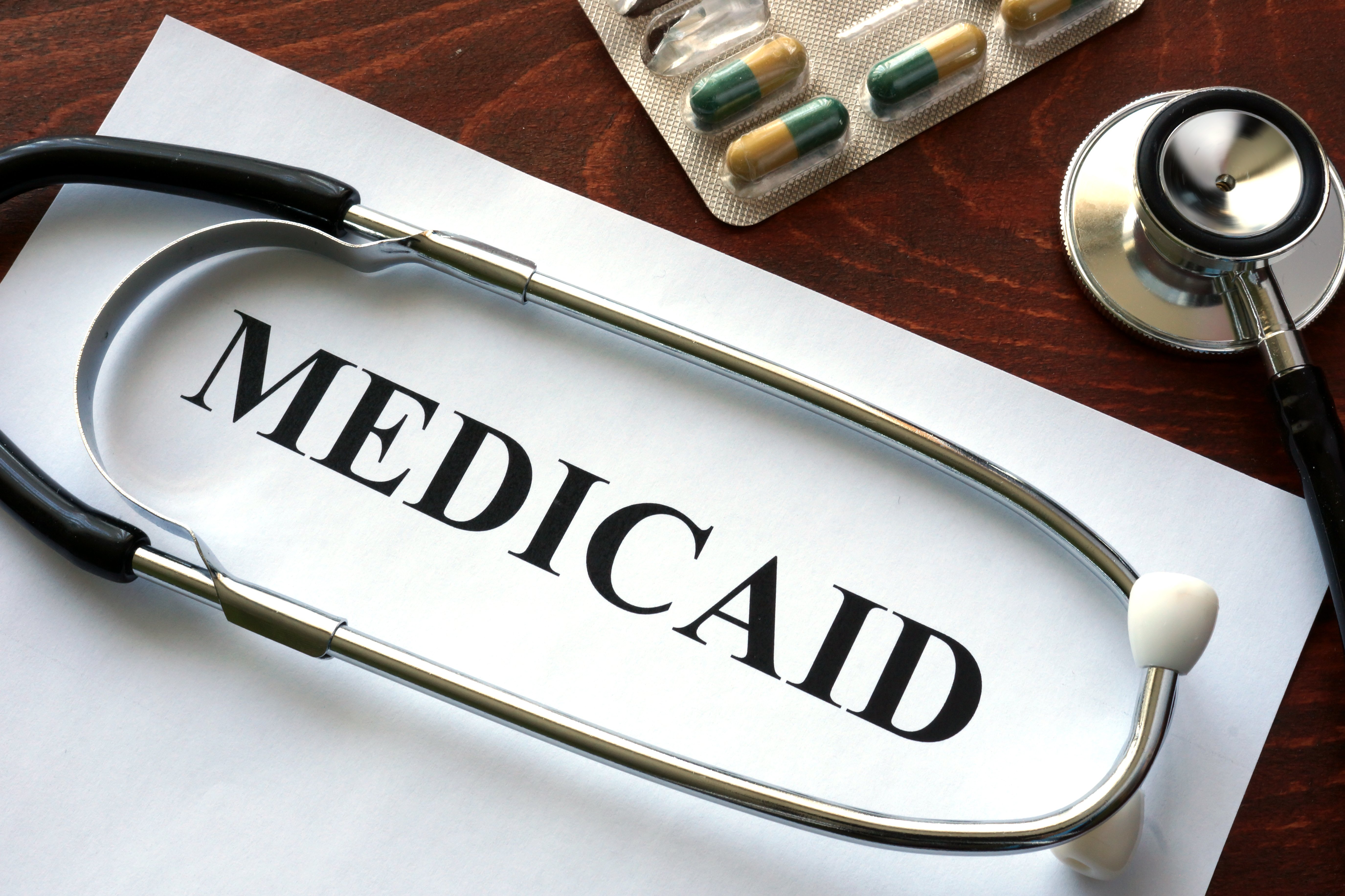 Medicaid on paper and a stethoscope 
