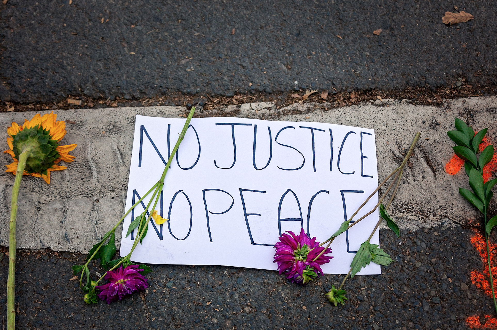 A sign that says no justice no peace