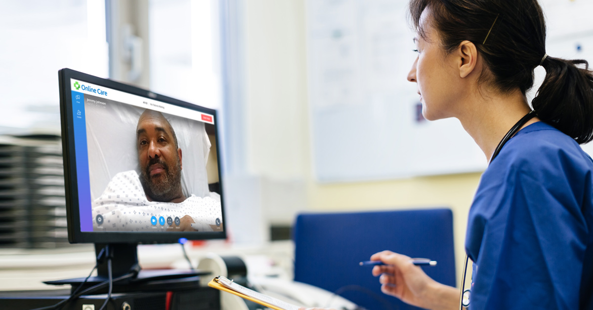 a female behavioral health specialist consults via video with a patient