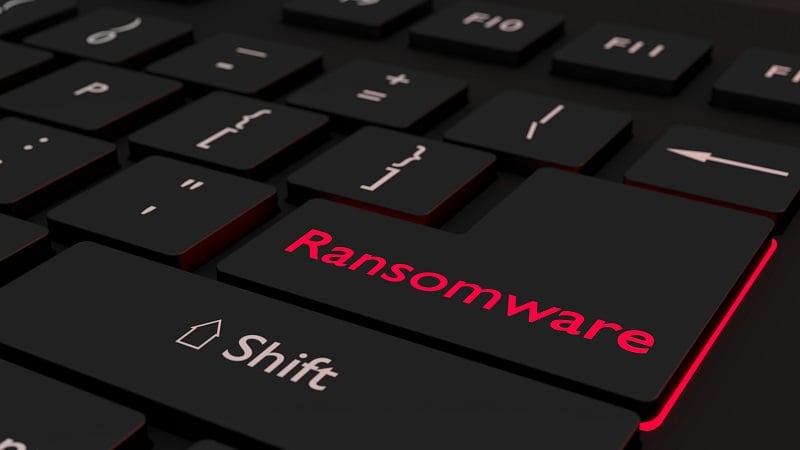 A computer keyboard with the word ransomware highlighted in red