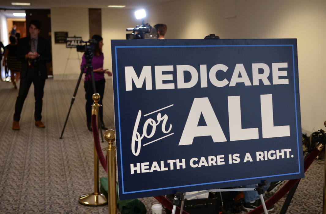 A political sign reading Medicare for All Healthcare is a right