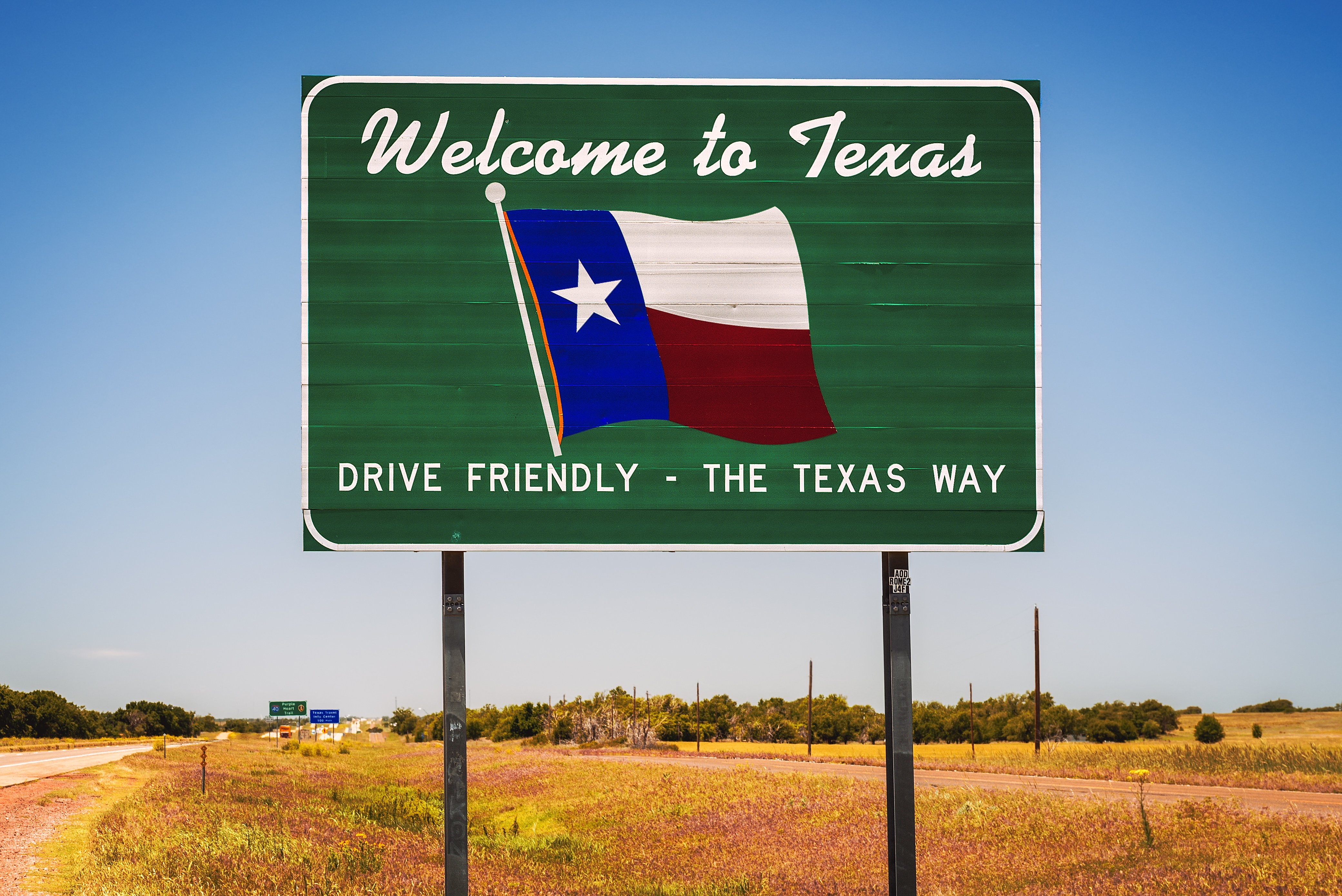 A road sign reading Welcome to Texas