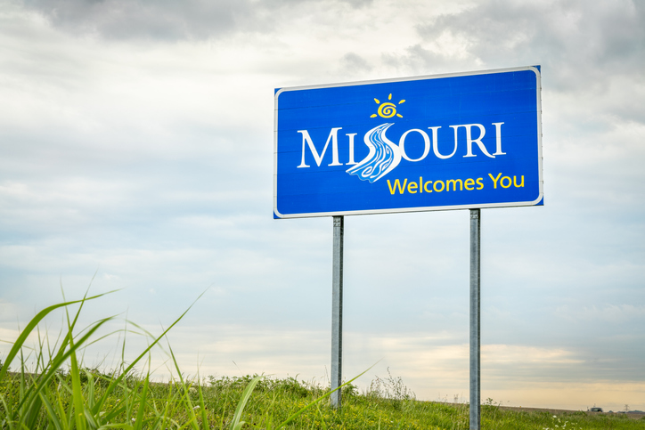 A road sign reading Missouri welcomes you