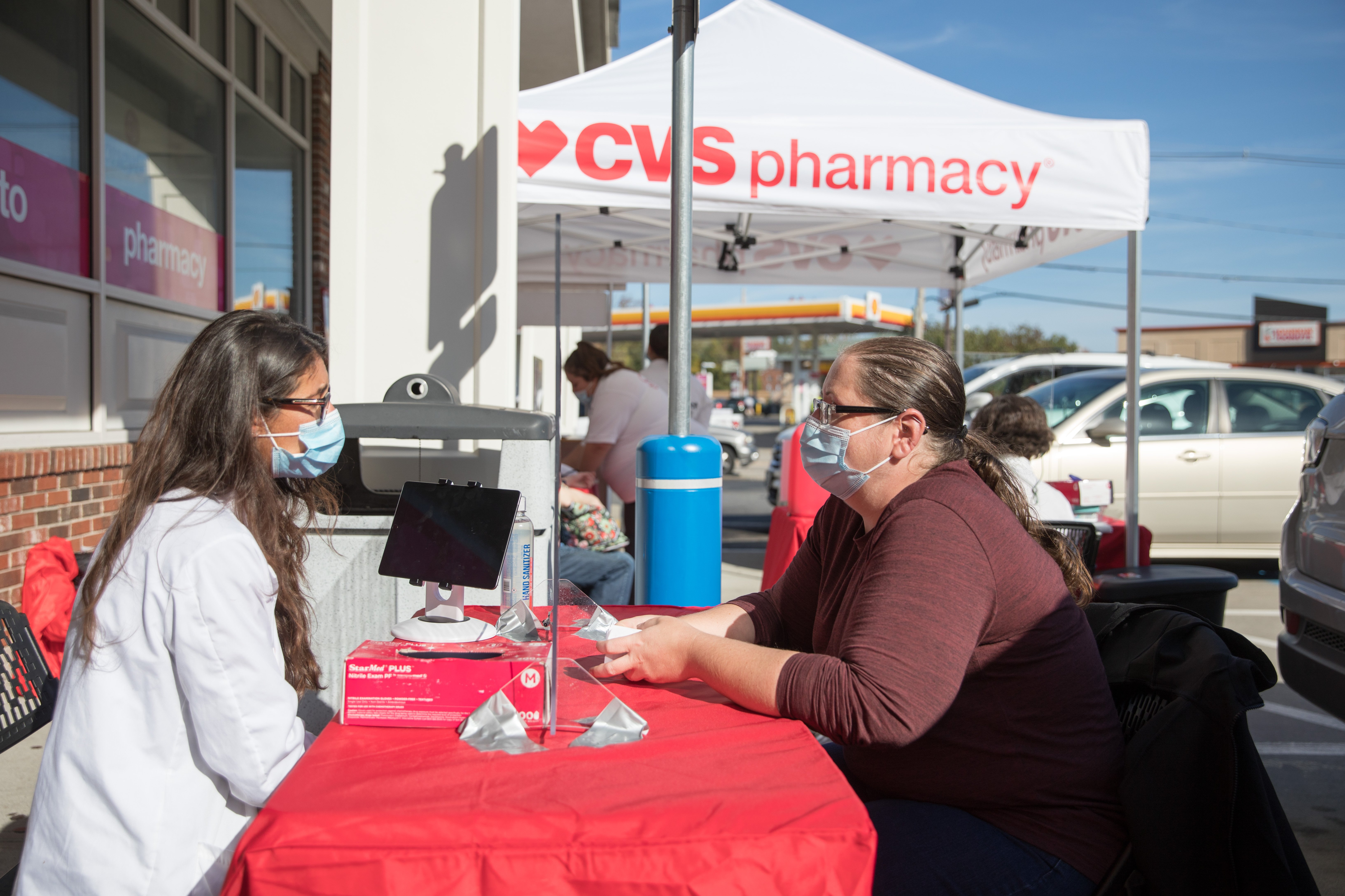 A woman attends a CVS Project Health screening event