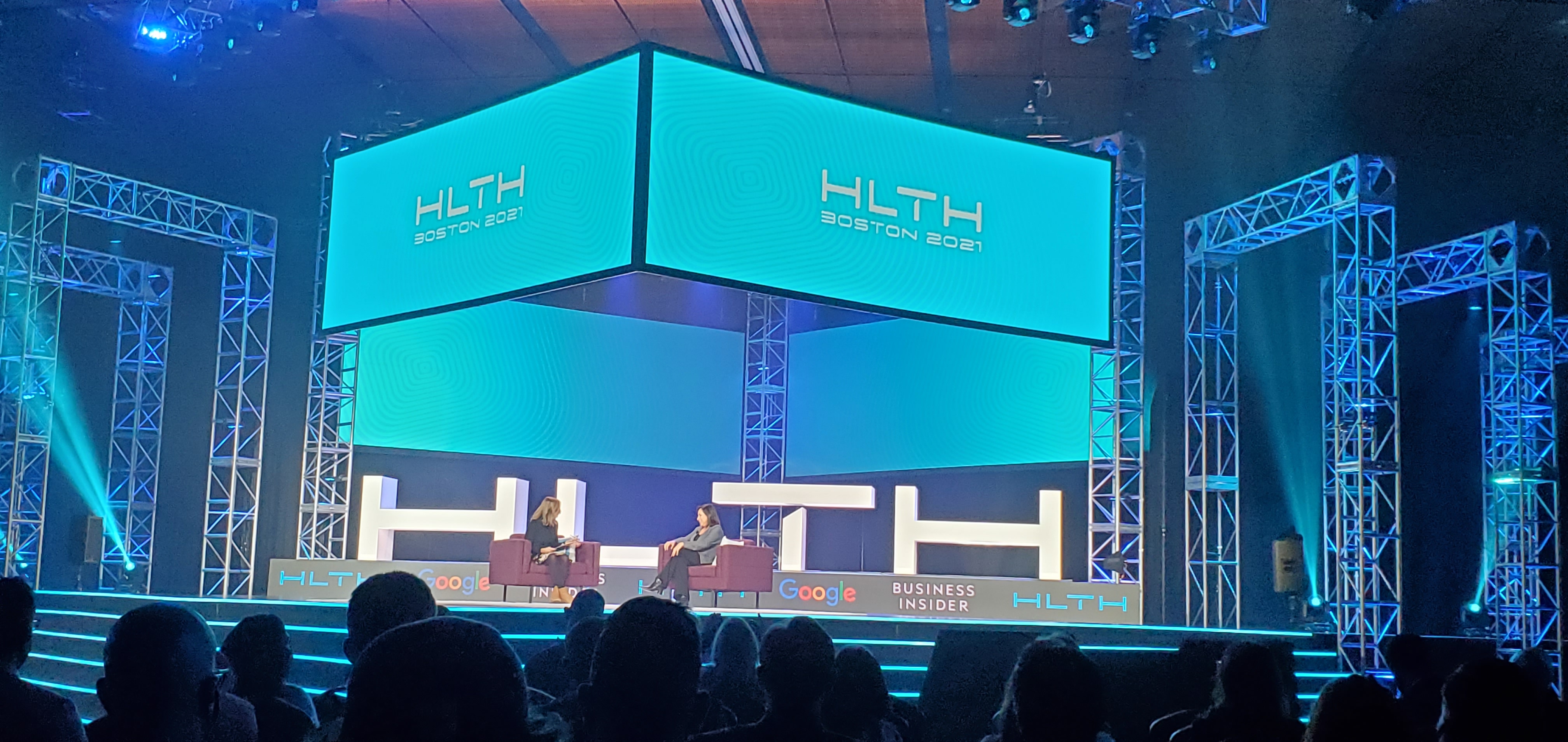 Karen DeSalvo and Lydia Ramsey Pflanzer on stage at HLTH 2021
