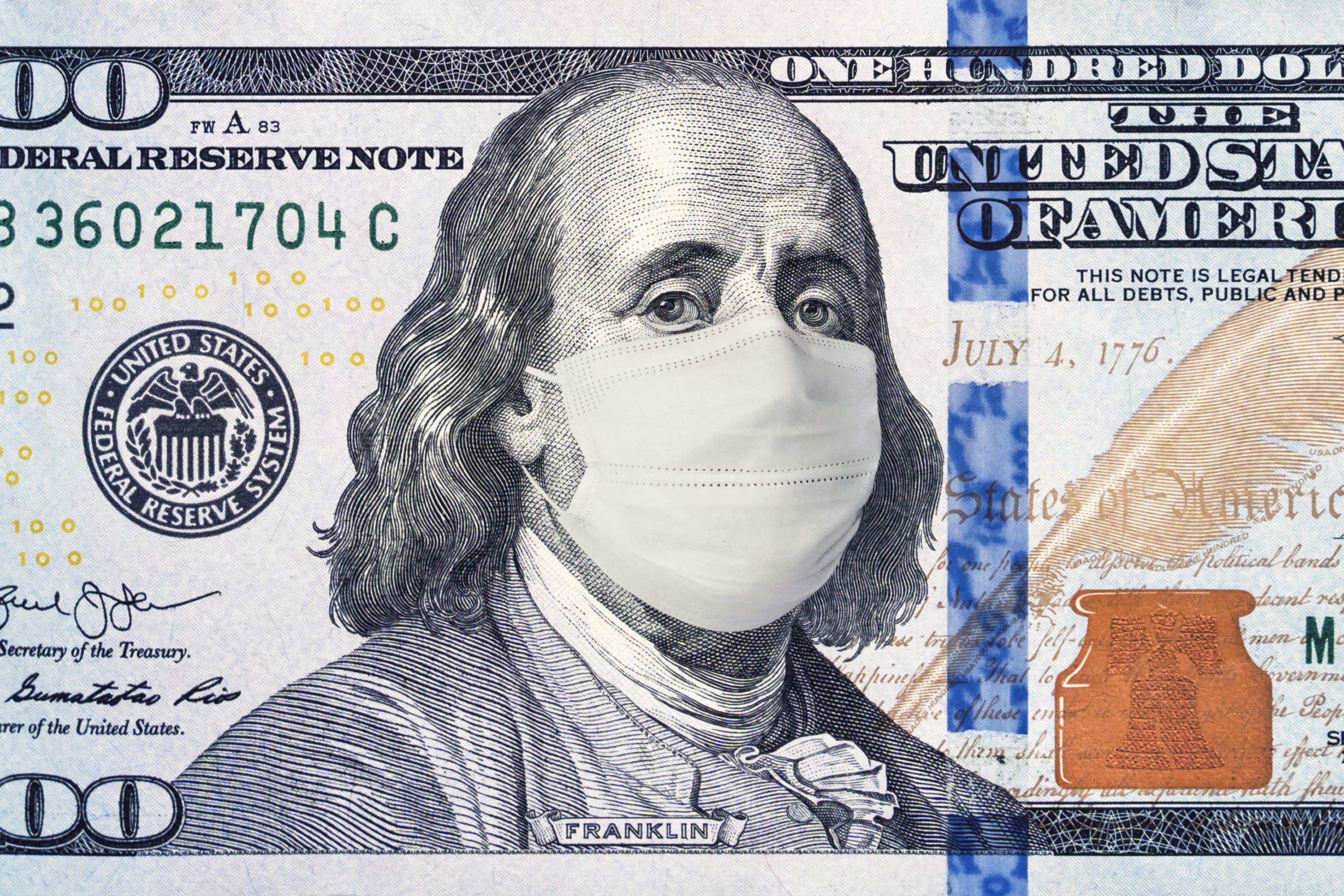 100 bill with face mask