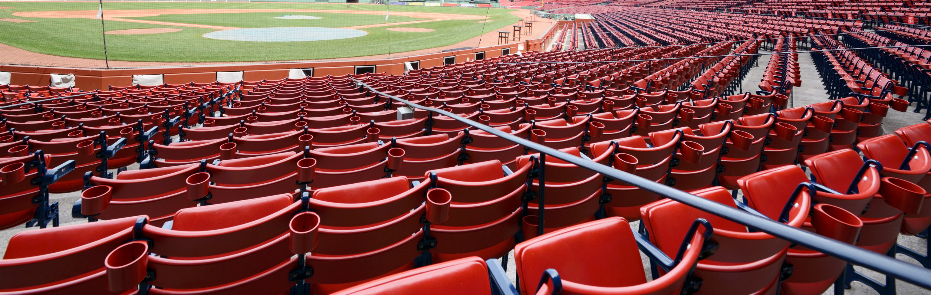Baseball stadium with rows of red seats