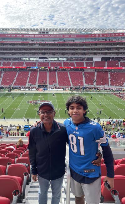 Photo of Verve CEO Sek Kathiresan with his son at a football game