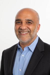 headshot photo of Micky Tripathi headshot photo of Micky Tripathi