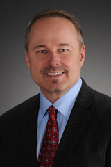 Photo of man in suit