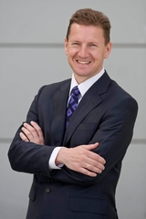 Photo of man in suit