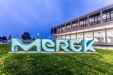 Merck KGaA facility with logo out front New Merck KGaA logo in front of company building