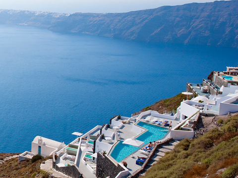 Chairs and tables overlooking water