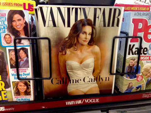 Caitlyn Jenner wearing a white one piece outfit