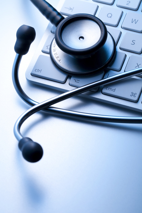 Stethoscope on computer keyboard