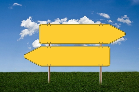 Two yellow arrows pointing in opposite directions