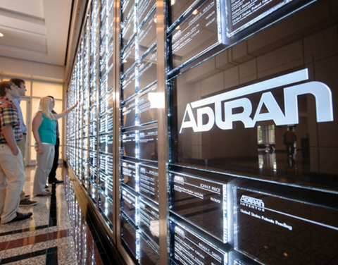 Adtran wall of plaques that represent patents
