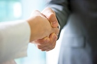 two people shaking hands