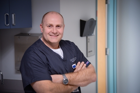 Mark Williams, nursing operations manager, Geisinger Shamokin Area Community Hospital, wears Geisinger's uniform for registered nurses.