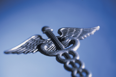 Medical symbol Caduceus Physician CREDIT: Comstock A photo of a Caduceus pin