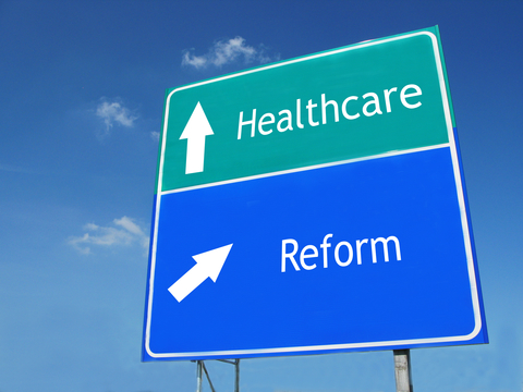 Healthcare reform (CREDIT: Getty/Eugenia Chaikina) Signs saying healthcare reform