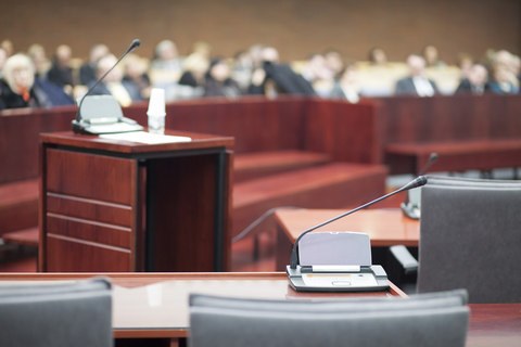Courtroom trial (Credit: Getty/aerogondo) Witness stand in courtroom