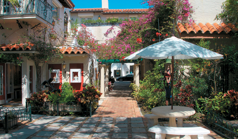 Palm Beach Worth Avenue in downtown Palm Beach is a destination unto itself, with restaurants and shops and plenty of resting areas with flowers and dappled sunlight.