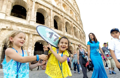 Disney Cruise Rome Editorial Children on a Disney cruise outside the Colosseum in Rome