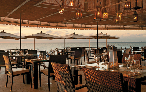 Grand Caymna Marriott Beach Hotel Grand Cayman Marriott Beach Resort’s newly revamped oceanfront restaurant, the Veranda and Vista Bar