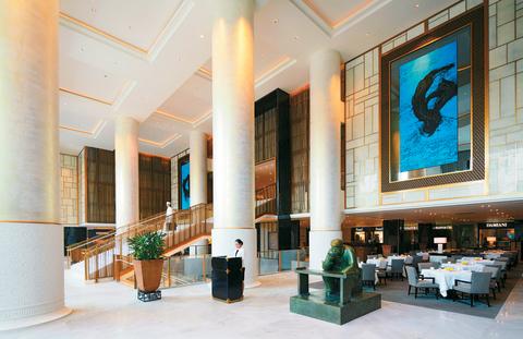 The Lobby The Lobby includes 16-foot abstract ink paintings, bronze sculptures of tea drinkers and a hand-carved jade “Spirit Wall” just beyond the entrance archway.
