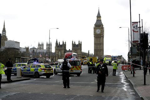 UK Parliament Shooting Police secure the area on the south side of Westminster Bridge close to the Houses of Parliament in London.