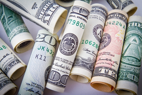 Colorful rolls of USD Cash Money Dollars
