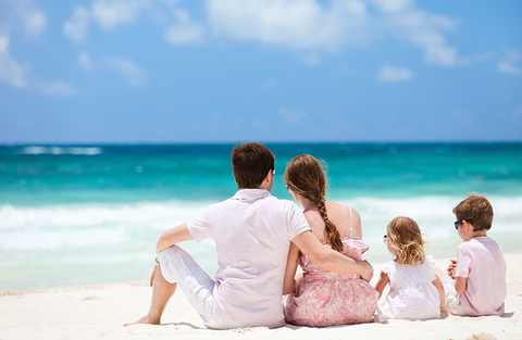 Mexico Family Getty Family vacationing on a beach