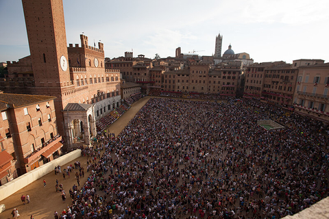 Piazza del Campo during the Siena Palio // Photo by occhetto/iStock/Getty Images Plus/Getty Images Piazza del Campo during the Siena Palio
