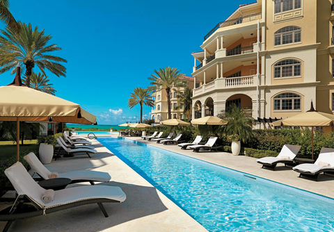 The Somerset on Grace Bay The reverse current lap pool at The Somerset on Grace Bay leads to a zero-entry, infinity-edge pool.