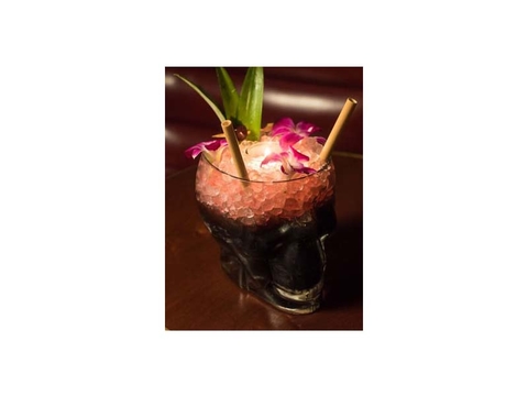 Perla Negra Festive Halloween cocktail with a spooky coloring.