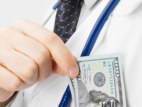 Doctor payment Doctor putting money in pocket
