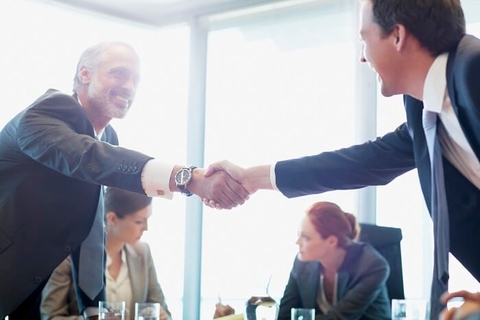 Collaboration Shake shaking hands business executive deal merger (Getty/Martin Barraud) Business executives shaking hands