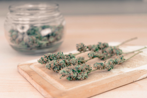 Marijuana on a cutting board Cannabis on a cutting board