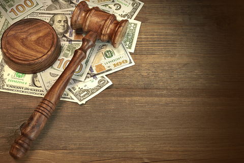gavel and money - AVNphotolab/iStock/Getty Images Plus/Getty Images gavel and money