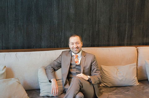 Fernando Gonzalez Revised Editorial Fernando Gonzalez sitting on a couch